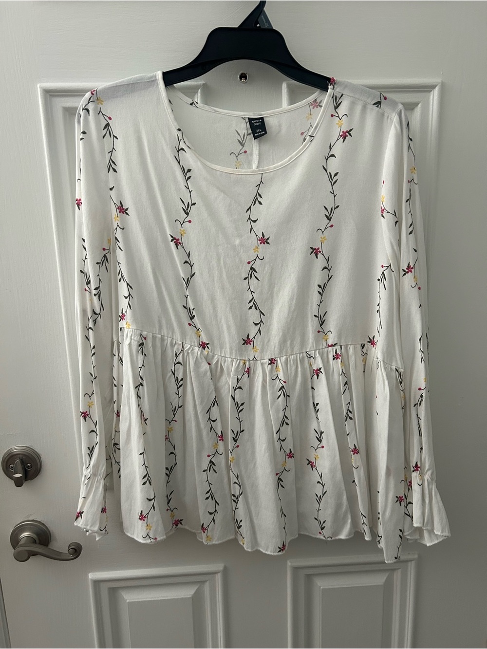 White Floral Peplum Long-Sleeve Top